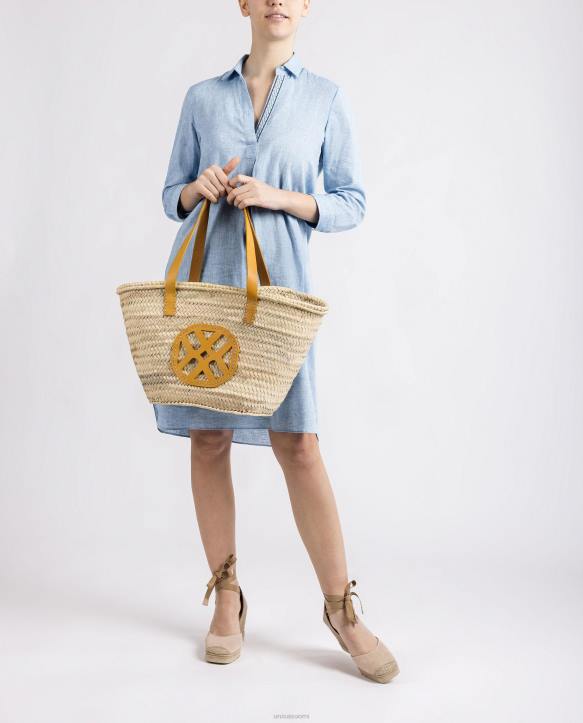 naiset Unisa keskikokoinen punottu kori, jossa nahkakahvat ja logo keltainenT08H1097