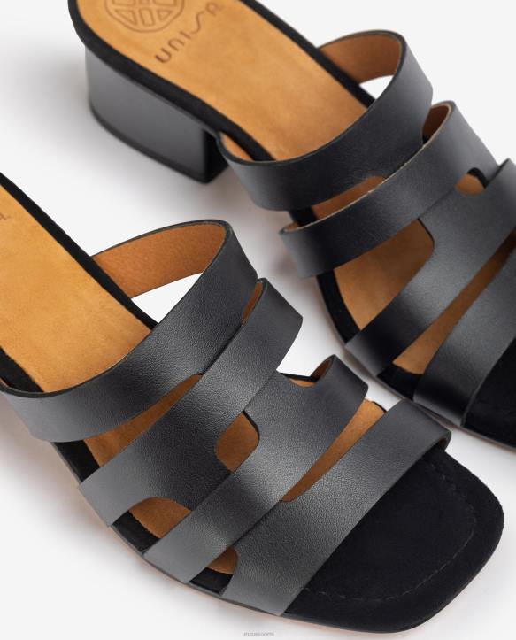 naiset Unisa leveä vamp-sandaali koristeellisilla rei\'ityksillä mustaT08H303