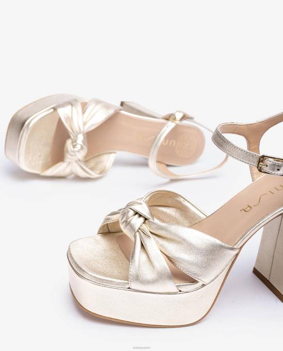 naiset Unisa neliömäinen sandaali, jossa solmu edessä kultaT08H50